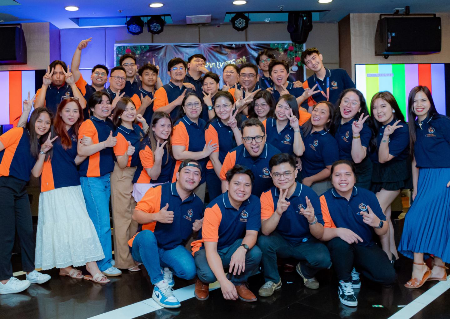 The Tritel Philippines team celebrating the company's 15th anniversary